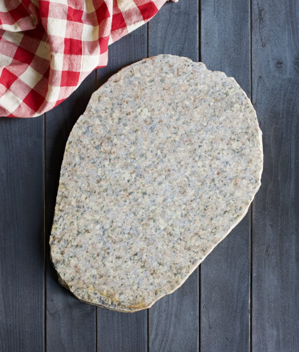 metamorphic stone charcuterie board with white and yellow colors from Cuttihunk Shellfish Farms - Cuttihunk Massachusetts
